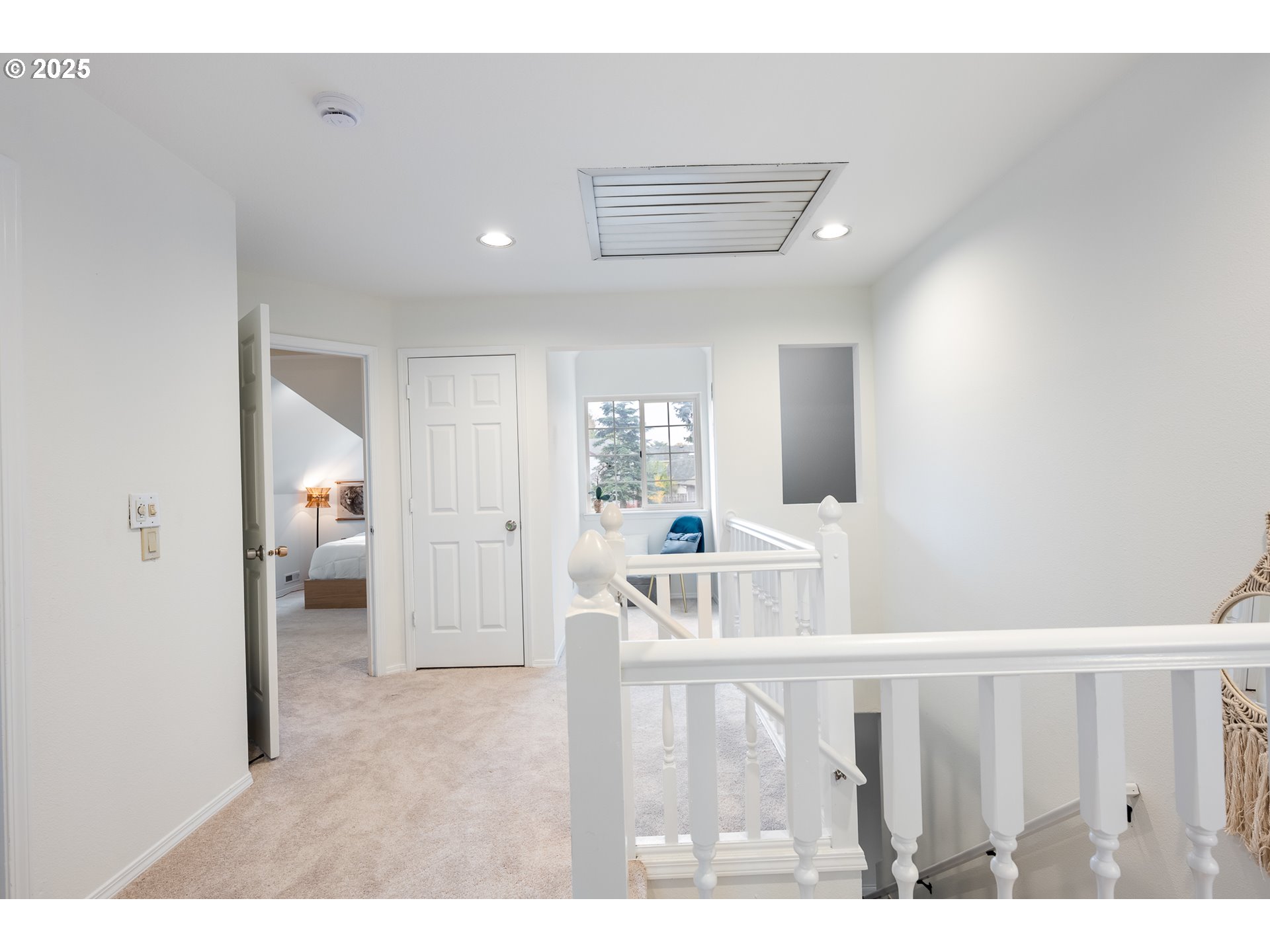 16033 Northwest Ridgetop Lane Beaverton, OR 97006 - Photo 18 of 42 a living room with furniture and a wooden floor