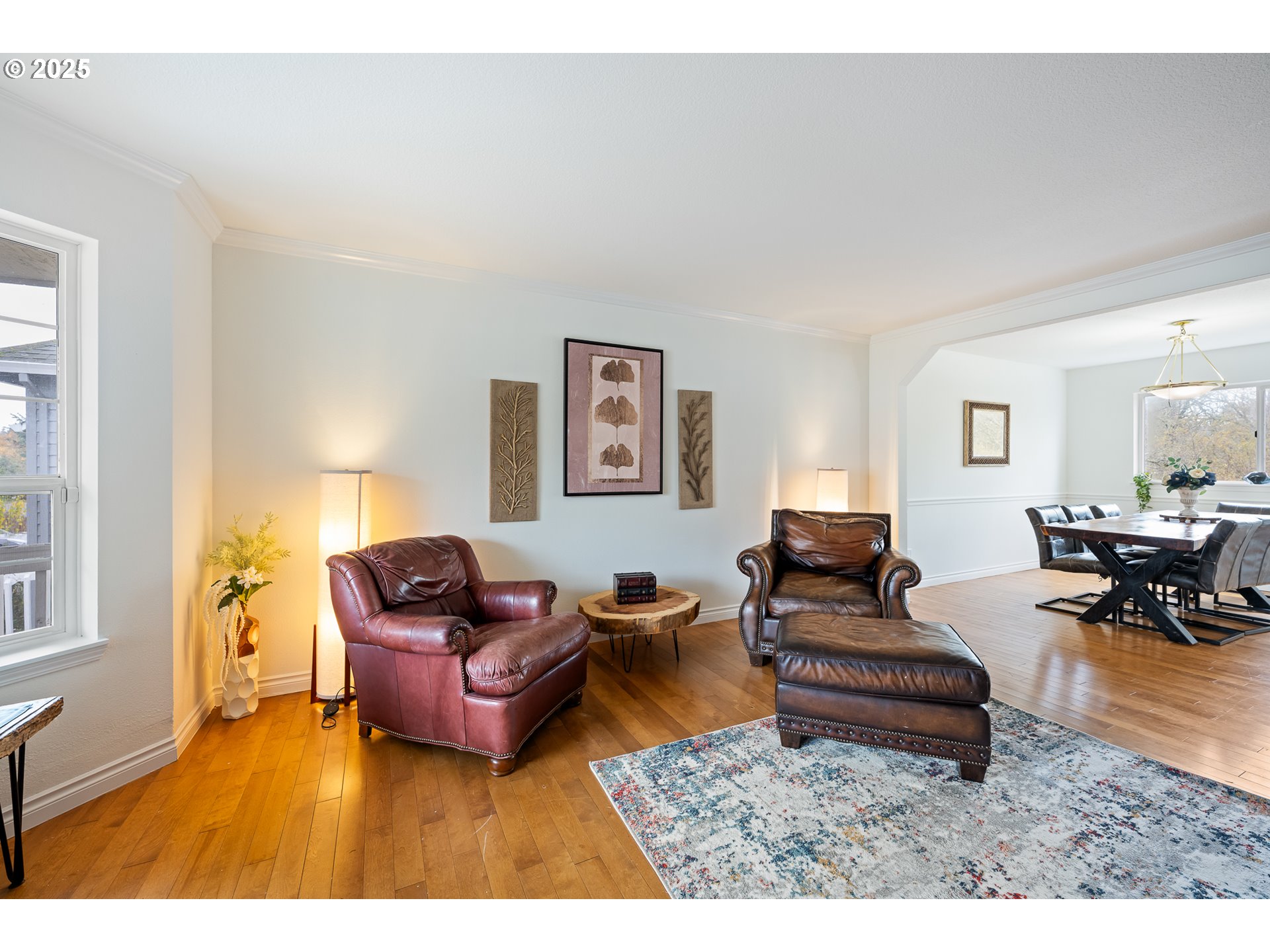 16033 Northwest Ridgetop Lane Beaverton, OR 97006 - Photo 2 of 42 a living room with furniture and wooden floor