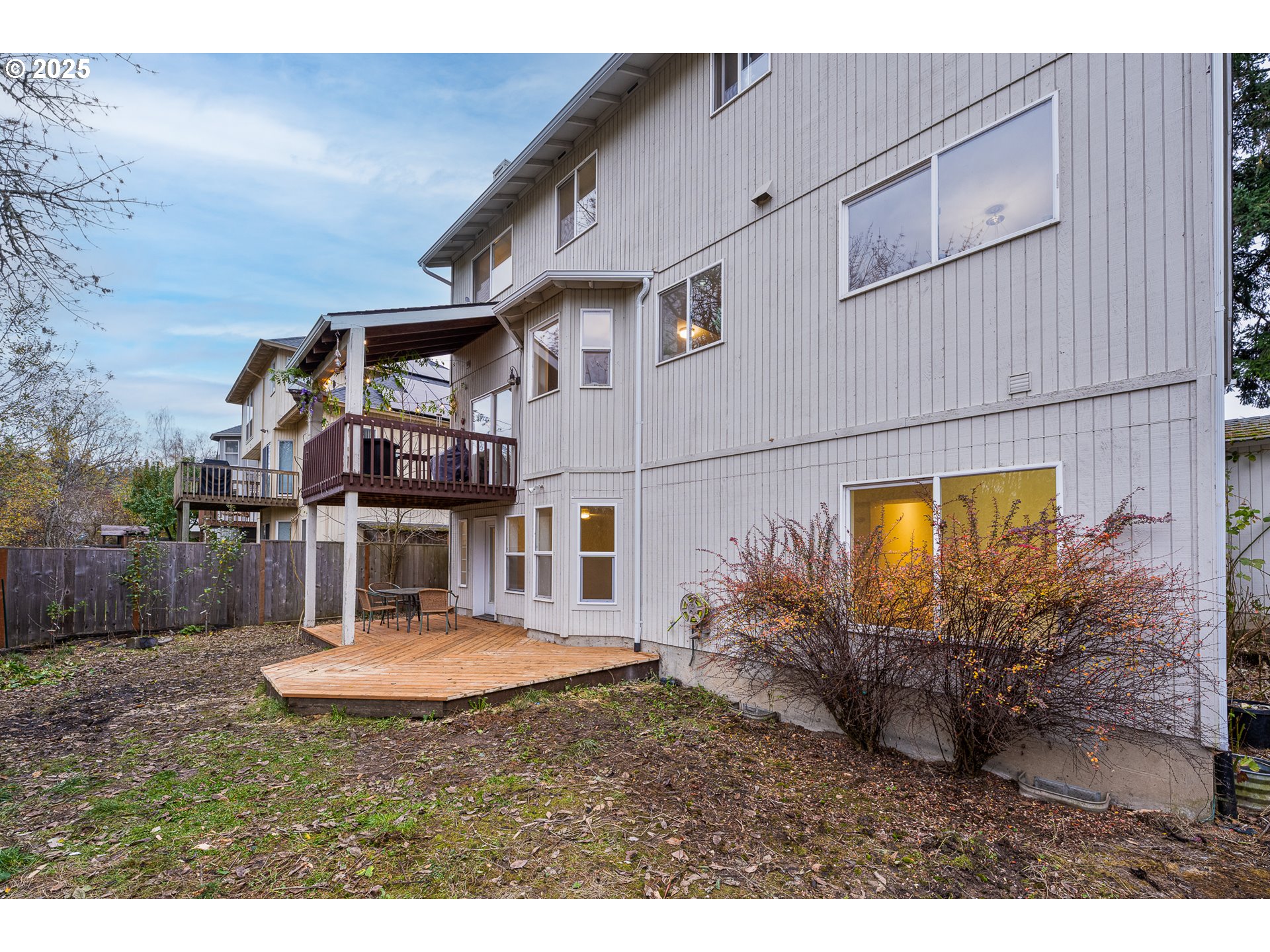 16033 Northwest Ridgetop Lane Beaverton, OR 97006 - Photo 37 of 42 a view of a house with brick walls and a small yard