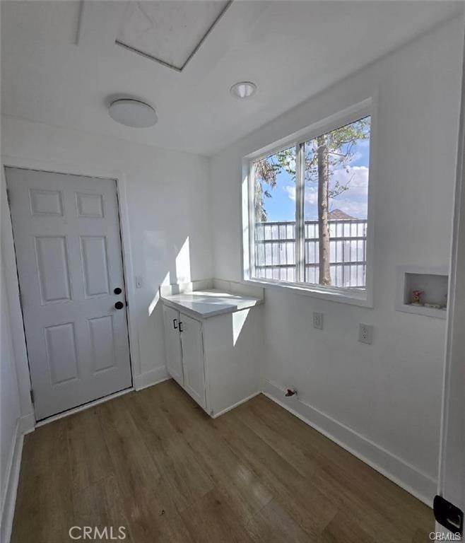 434 Highland Avenue Riverside, CA 92507 - Photo 3 of 15 a room with a window and wooden floor