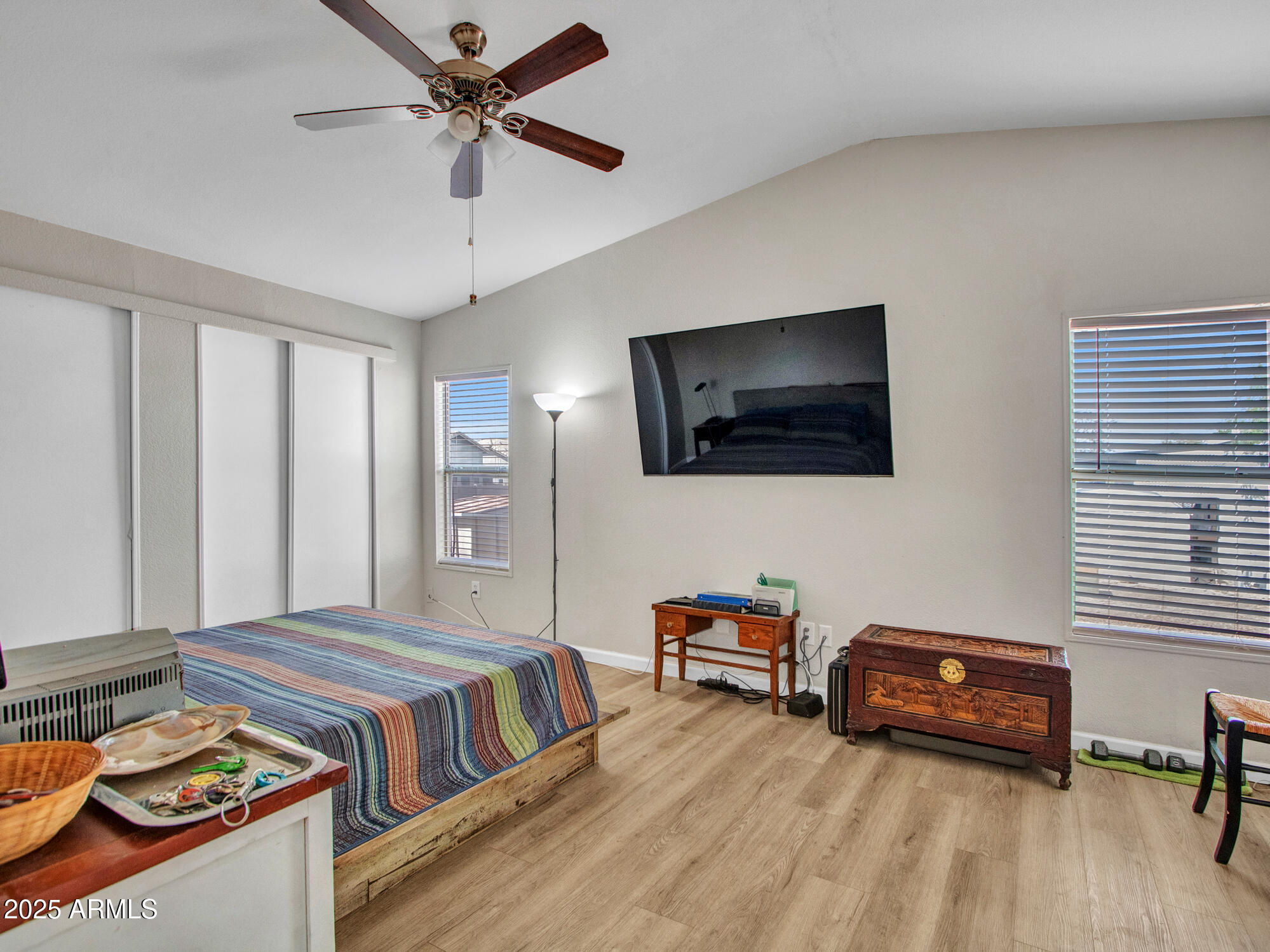6227 North Litchfield Road, Unit 69 Litchfield Park, AZ 85340 - Photo 21 of 30 a living room with furniture and a flat screen tv