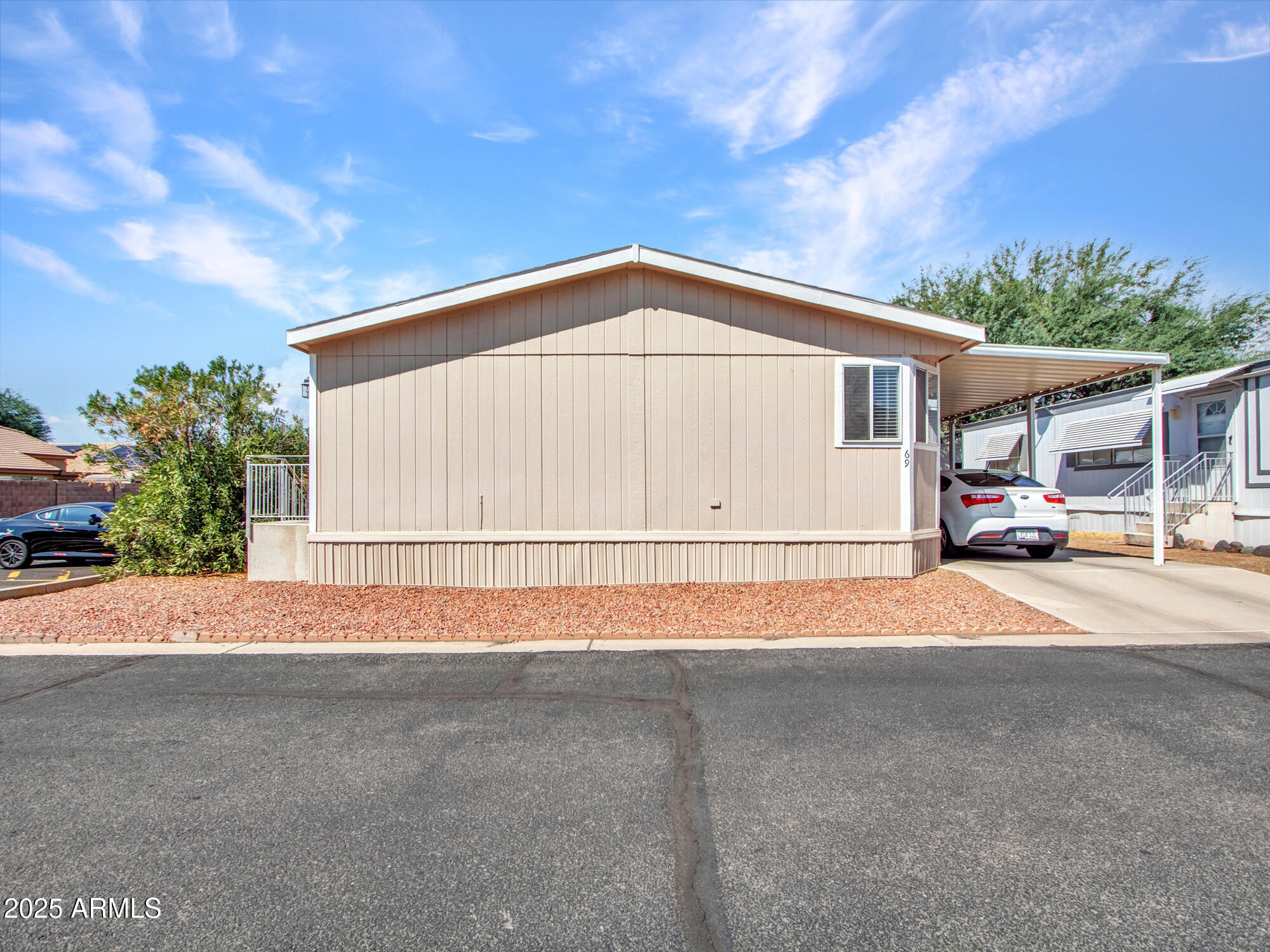 6227 North Litchfield Road, Unit 69 Litchfield Park, AZ 85340 - Photo 2 of 30 a view of backyard of house