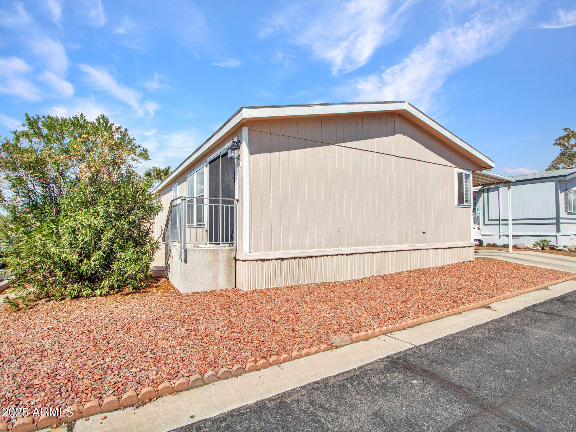 6227 North Litchfield Road, Unit 69 Litchfield Park, AZ 85340 - Photo 3 of 30 a view of backyard of house