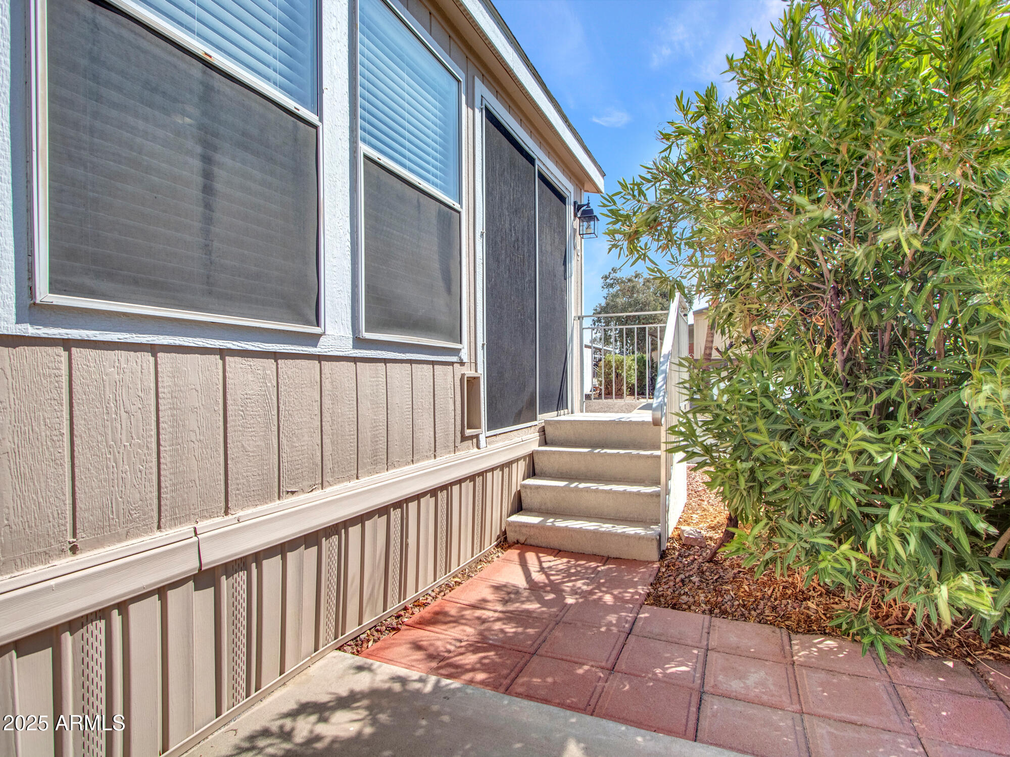 6227 North Litchfield Road, Unit 69 Litchfield Park, AZ 85340 - Photo 8 of 30 a view of a house with a large window
