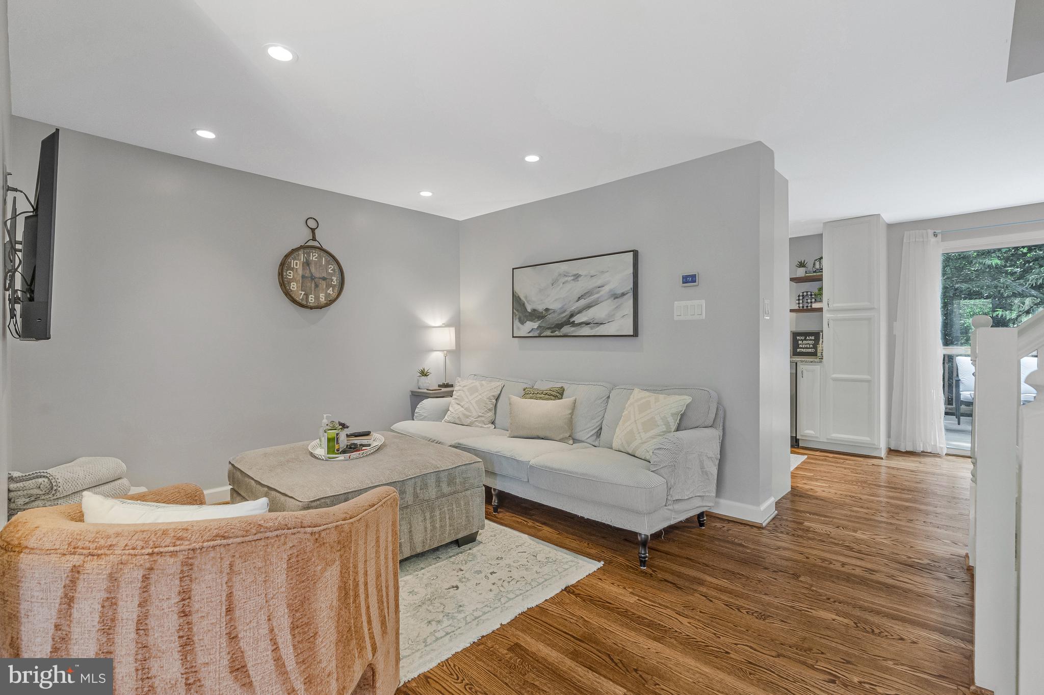 11046 Granby Court Reston, VA 20191 - Photo 9 of 43 a living room with furniture and a table