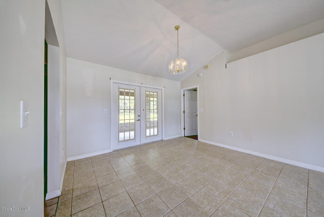 307 Abello Road Southeast Palm Bay, FL 32909 - Photo 3 of 30 Dining Room with Tile Floors