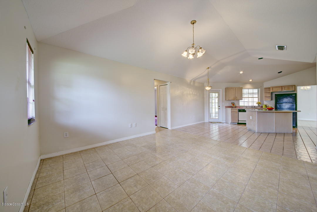 307 Abello Road Southeast Palm Bay, FL 32909 - Photo 7 of 30 Family Room with Tile Floors