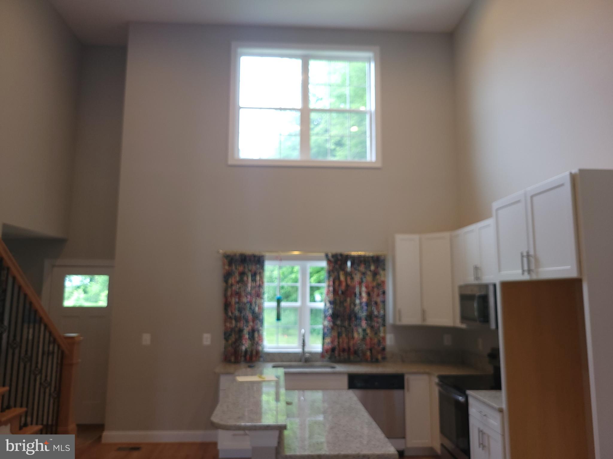 158 Watermans Cv Lane Chester, MD 21619 - Photo 6 of 12 Two-story cathedral ceiling..bright and airy