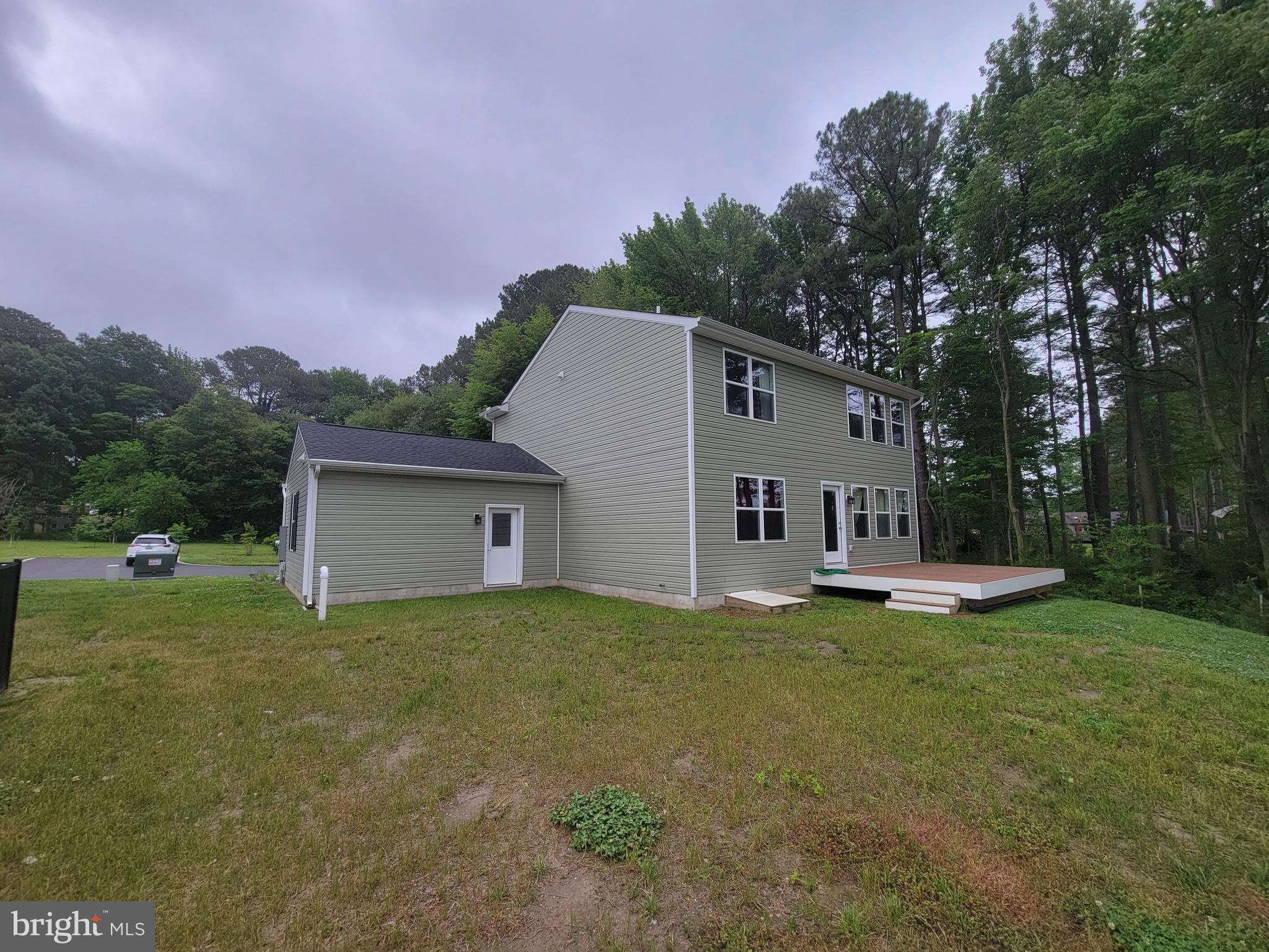 158 Watermans Cv Lane Chester, MD 21619 - Photo 7 of 12 Rearview of home showing deck