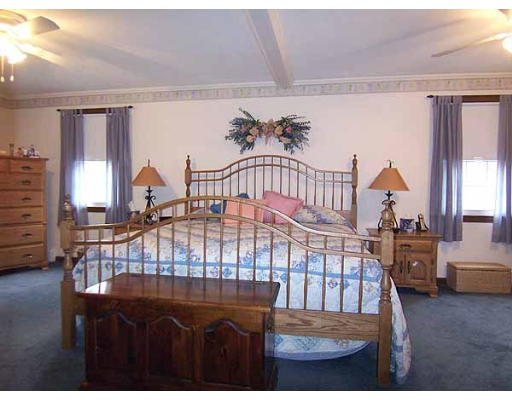 49 Dutchess Street Springfield, MA 01129 - Photo 11 of 25 a bedroom with furniture and a window