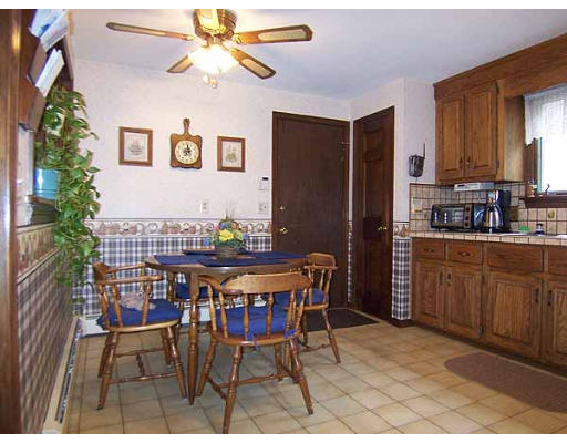 49 Dutchess Street Springfield, MA 01129 - Photo 2 of 25 a view of a dining room with furniture