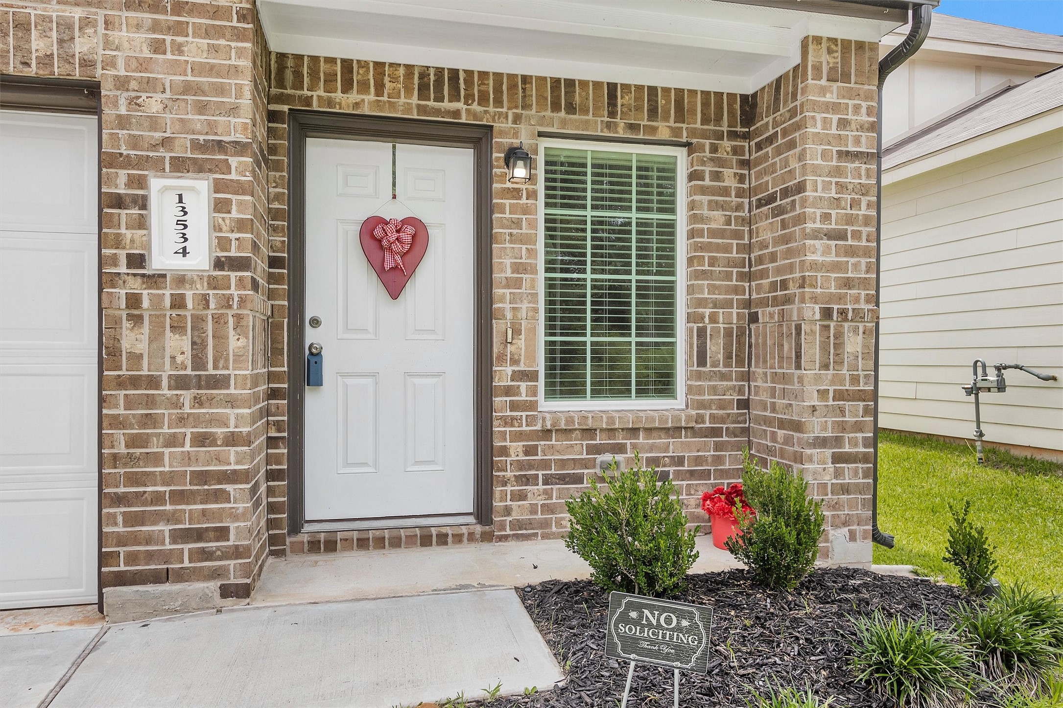 13534 Luke Prairie Willis, TX 77378 - Photo 2 of 29 Covered front porch.