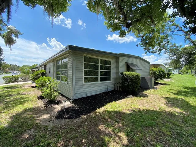 a view of a street with sitting area
