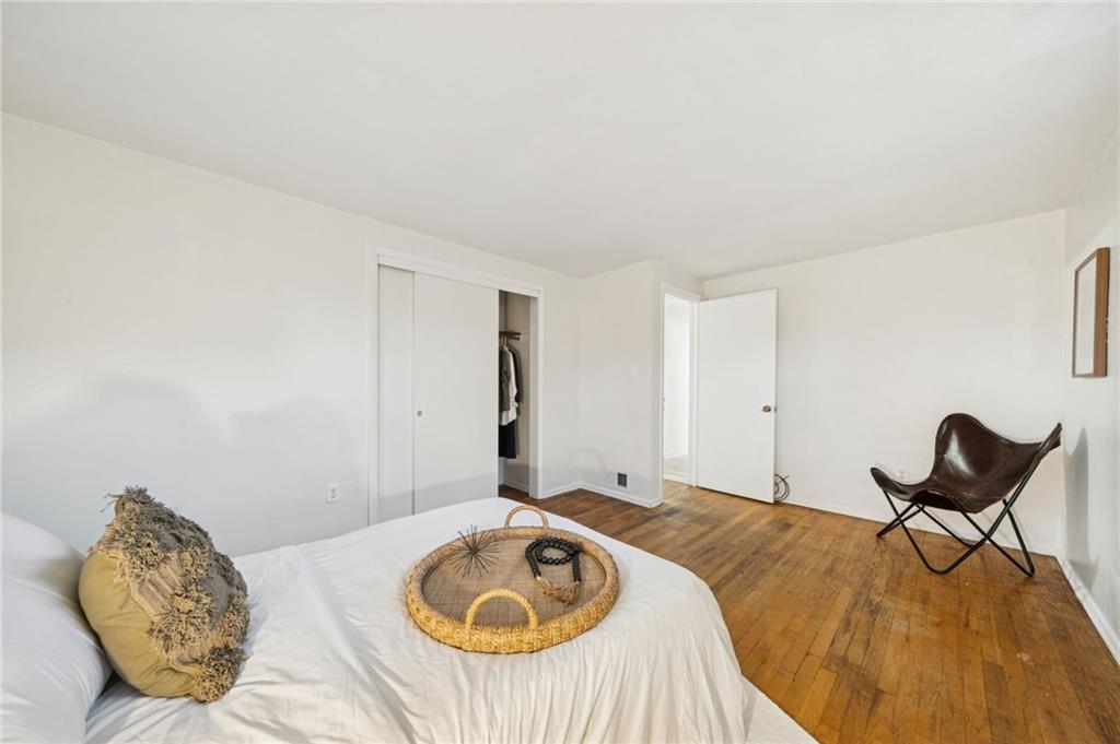 116 Grange Road Greensburg, PA 15601 - Photo 13 of 29 a bedroom with a bed and chair