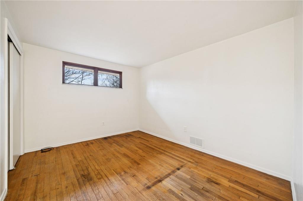 116 Grange Road Greensburg, PA 15601 - Photo 16 of 29 a view of a room with wooden floor