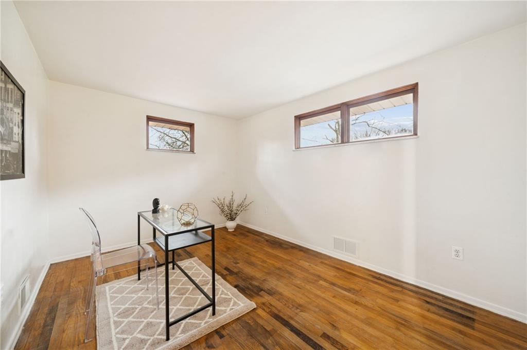 116 Grange Road Greensburg, PA 15601 - Photo 17 of 29 a workspace room with furniture and wooden floor