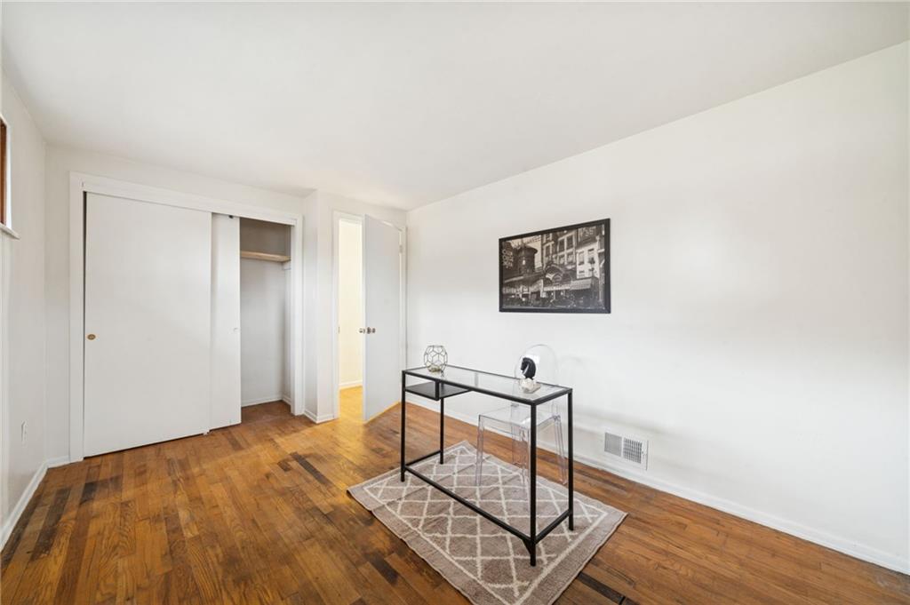 116 Grange Road Greensburg, PA 15601 - Photo 18 of 29 a bedroom with a bed and a table