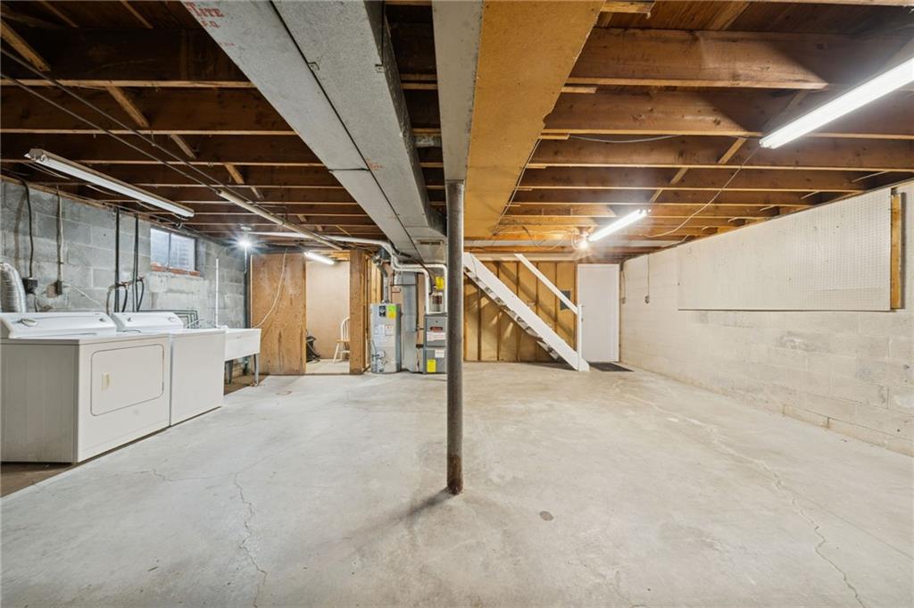 116 Grange Road Greensburg, PA 15601 - Photo 19 of 29 a view of an empty room with stairs
