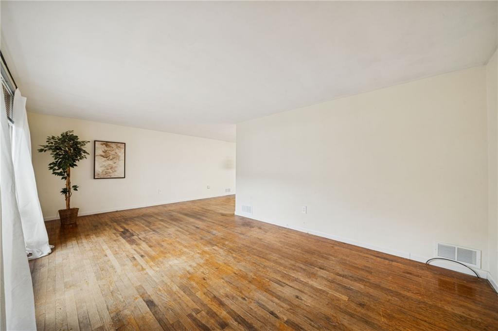 116 Grange Road Greensburg, PA 15601 - Photo 5 of 29 a view of an empty room and window
