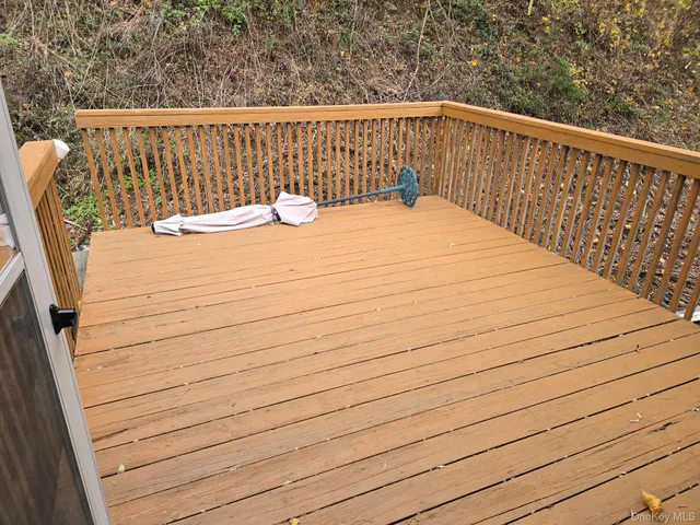 a view of balcony with a potted plant