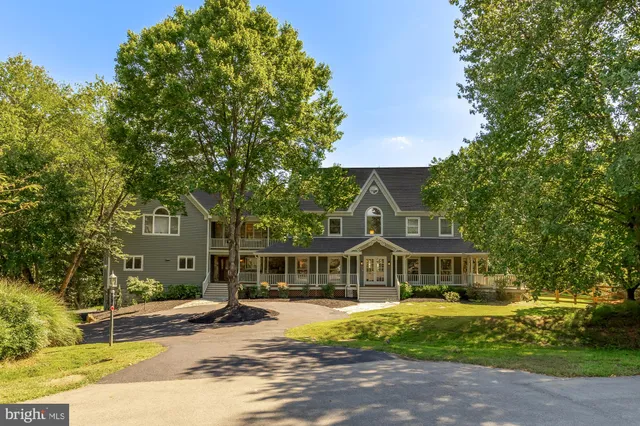 a front view of a house with a porch