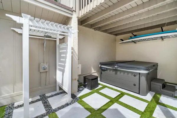 a view of a deck with furniture