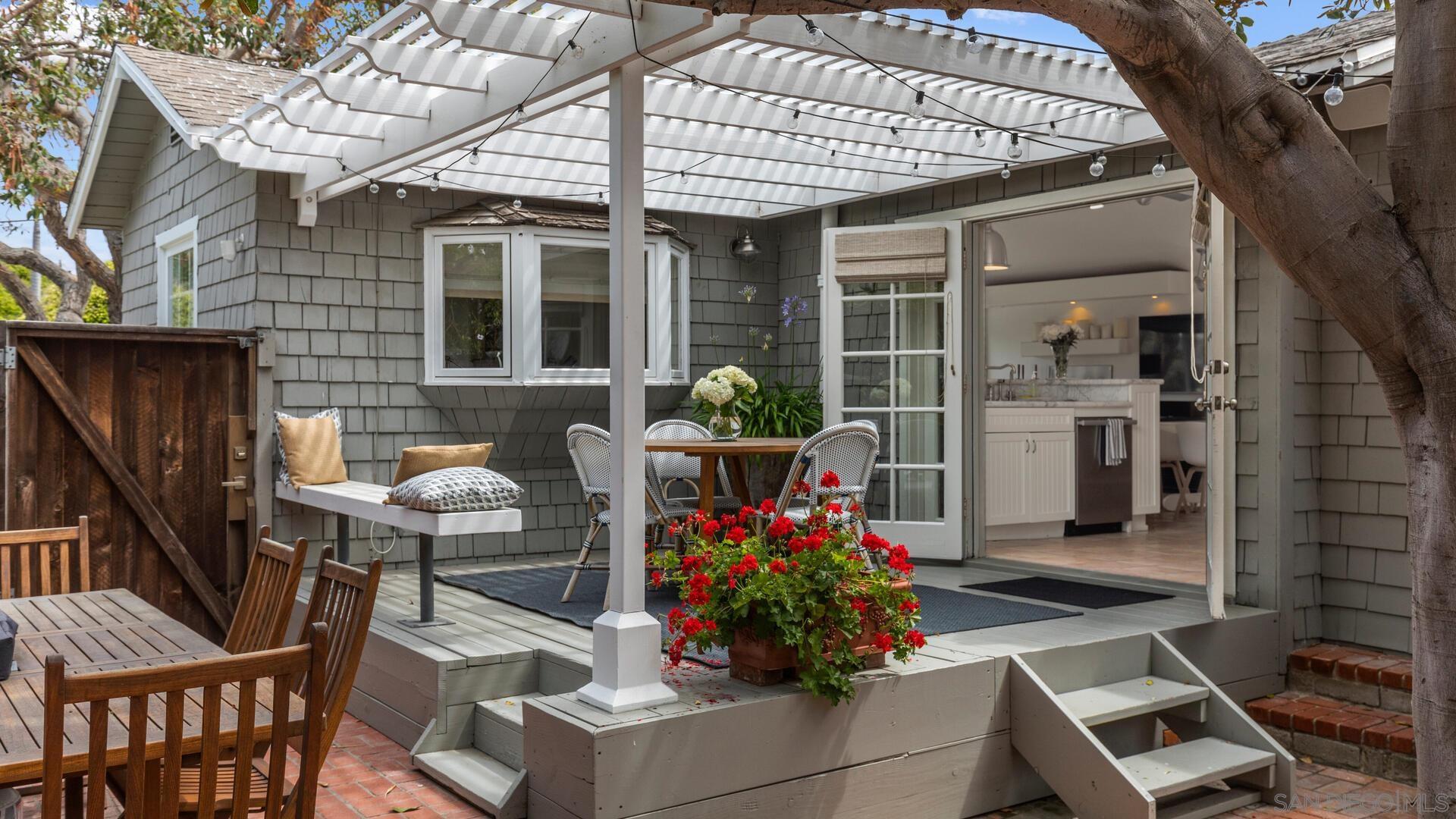 253 26th Street Del Mar, CA 92014 - Photo 13 of 22 a front view of a house with a porch