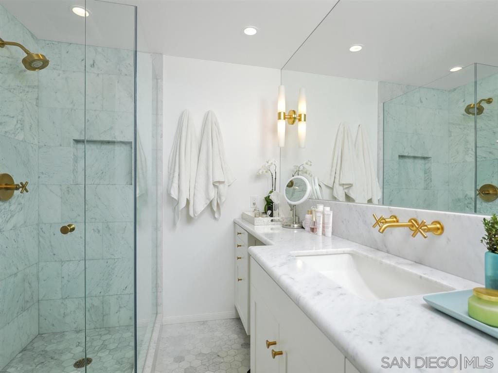 253 26th Street Del Mar, CA 92014 - Photo 18 of 22 a bathroom with a granite countertop sink a shower and a mirror