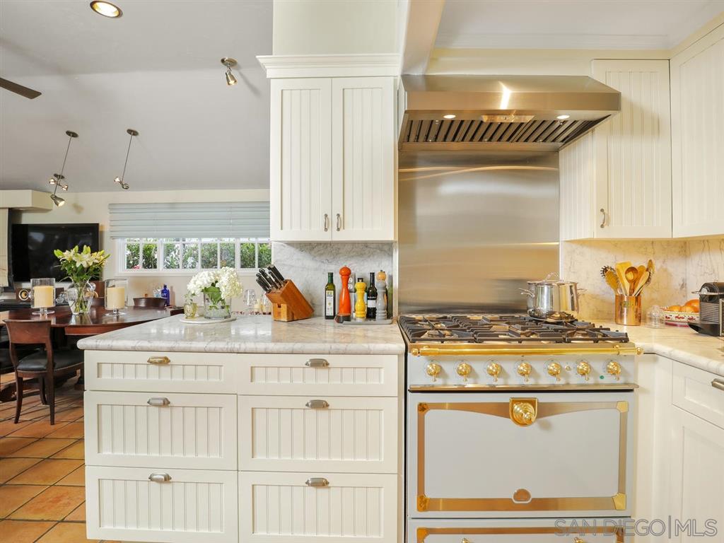 253 26th Street Del Mar, CA 92014 - Photo 2 of 22 a kitchen with stainless steel appliances granite countertop a stove a sink and a refrigerator