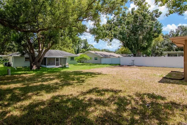a house with trees in front of it