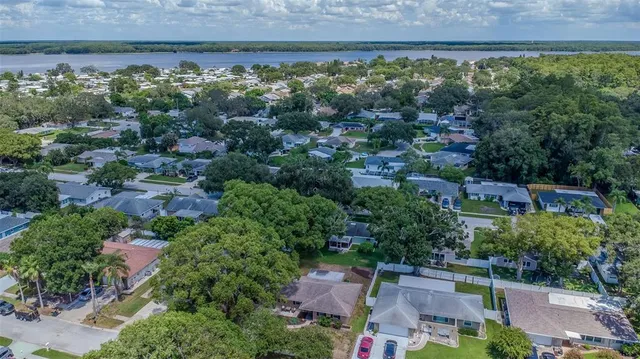 an aerial view of a house with a garden
