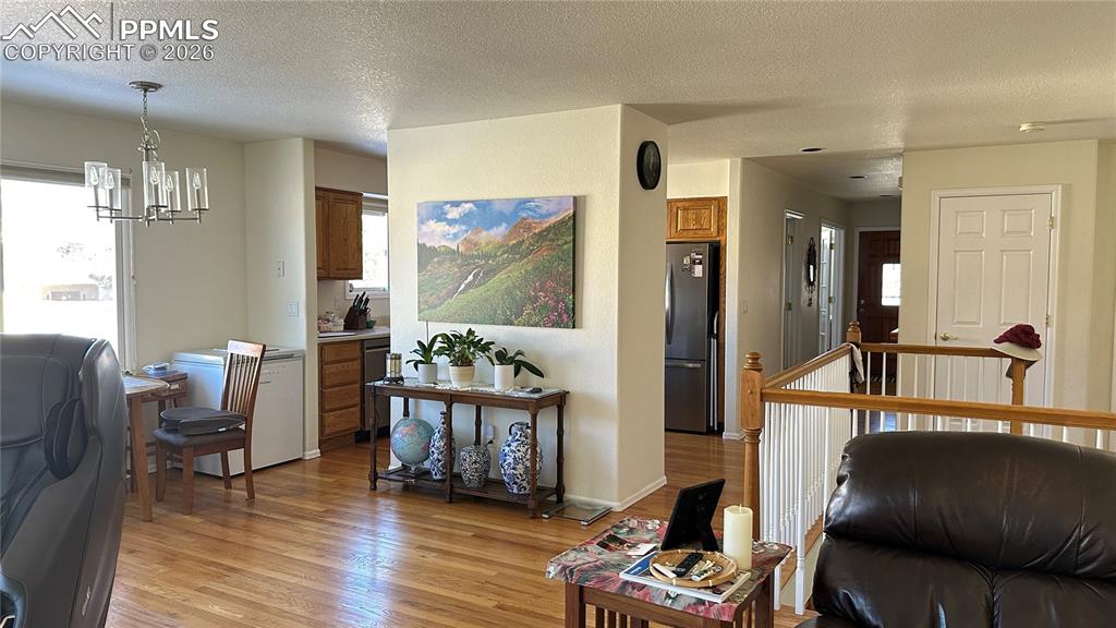 198 Luxury Lane Colorado Springs, CO 80921 - Photo 23 of 34 a living room with furniture and a window