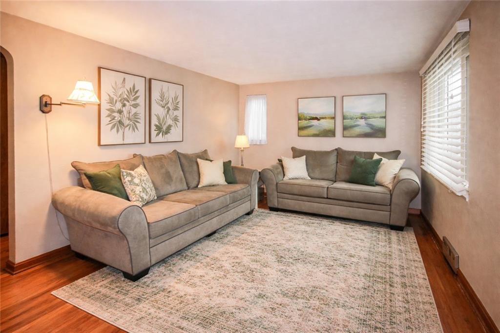 164 Gill Hall Road Clairton, PA 15025 - Photo 4 of 30 a living room with furniture and a large window