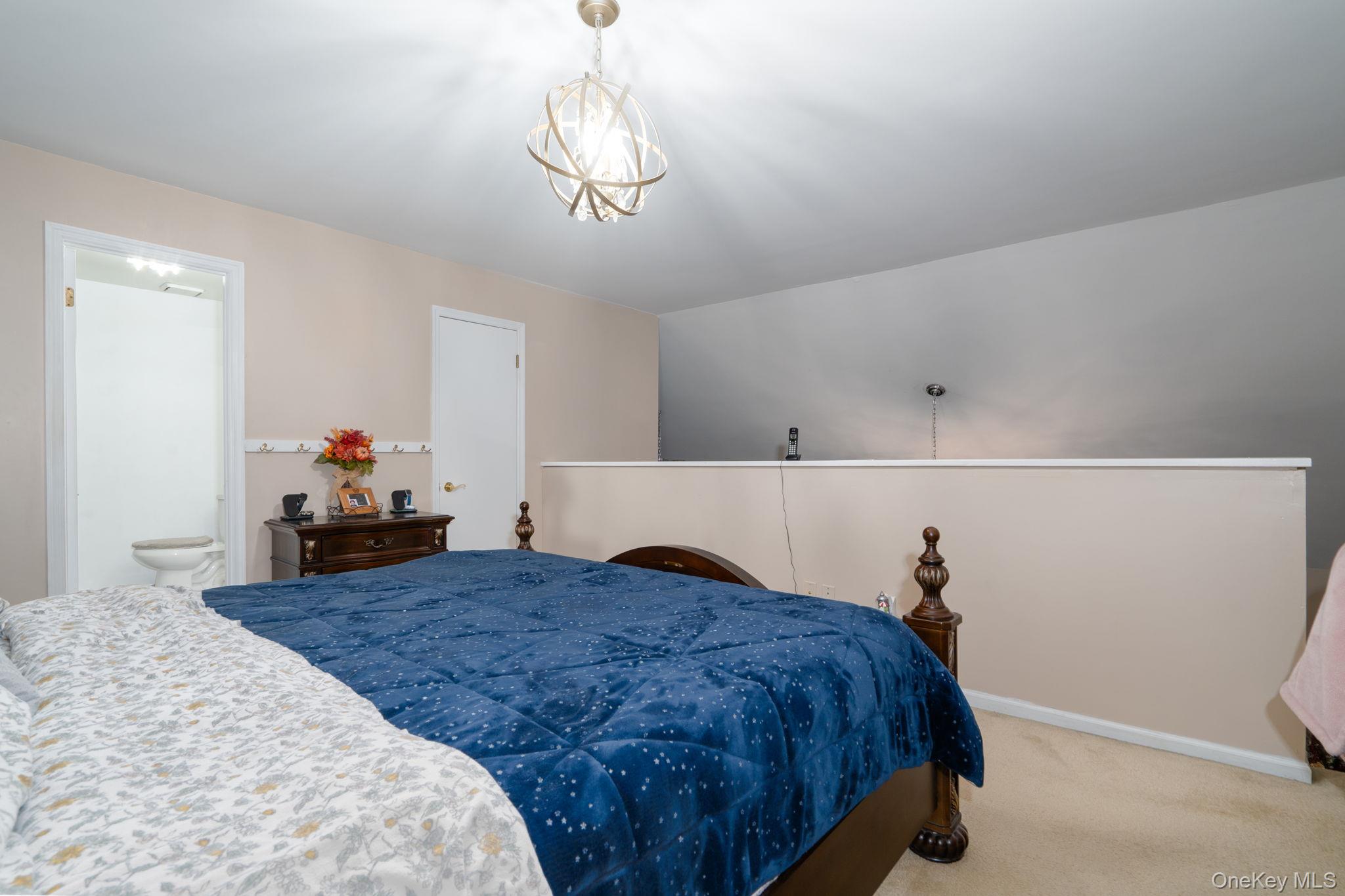 205 Ramapo Road, Unit H Garnerville, NY 10923 - Photo 18 of 31 a bed room with a bed and dresser