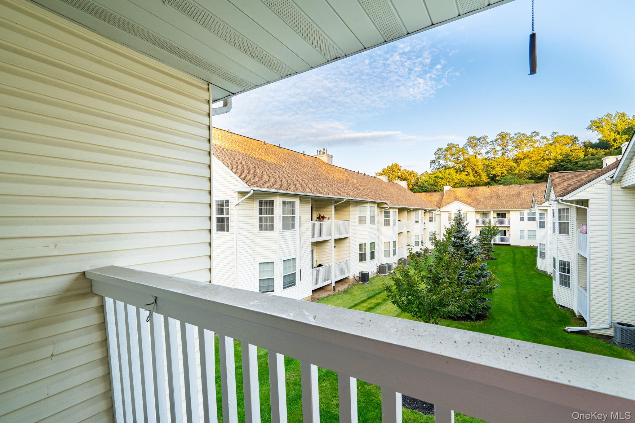 205 Ramapo Road, Unit H Garnerville, NY 10923 - Photo 27 of 31 a view of a balcony with flower plants