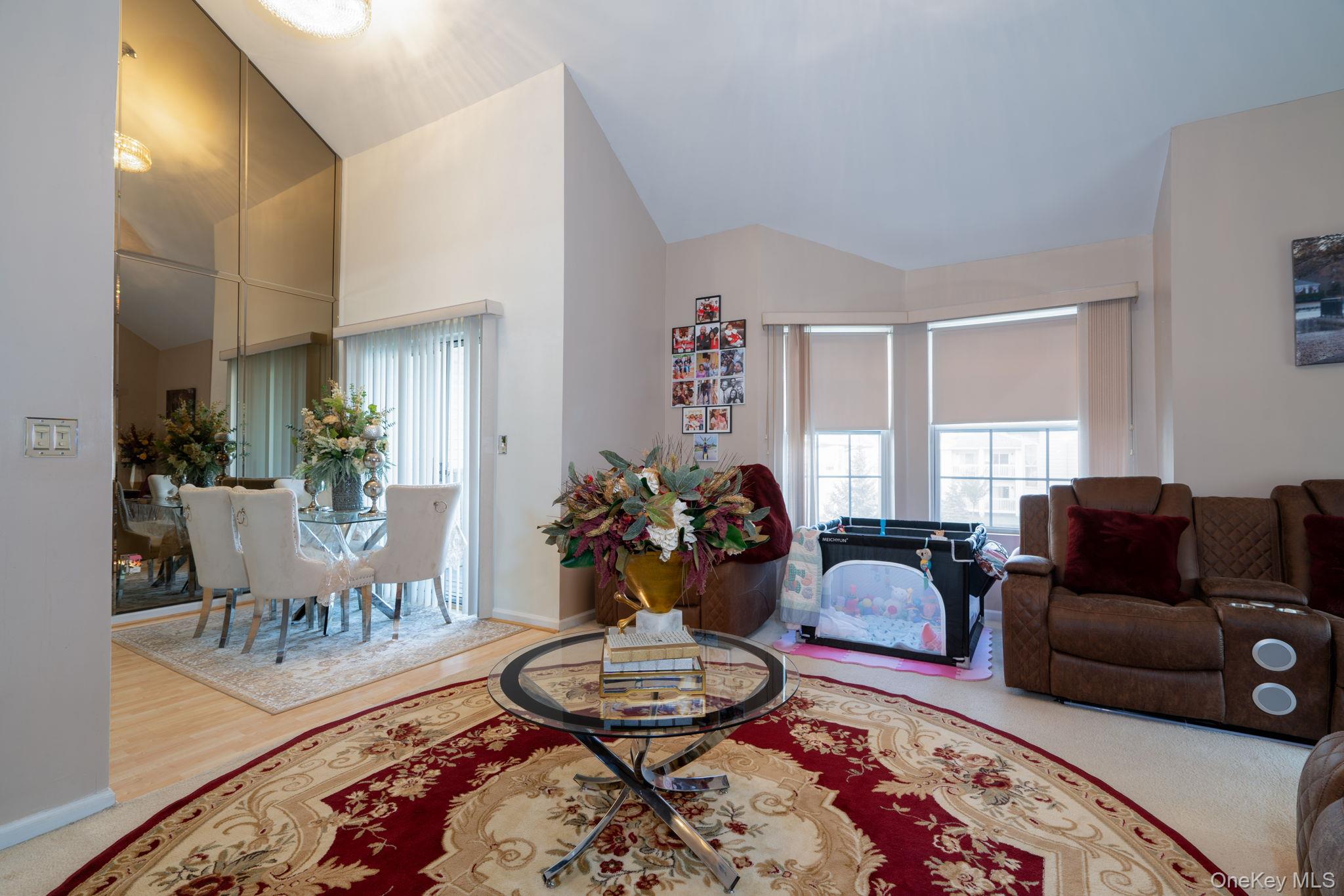 205 Ramapo Road, Unit H Garnerville, NY 10923 - Photo 4 of 31 a living room with furniture and a wooden floor