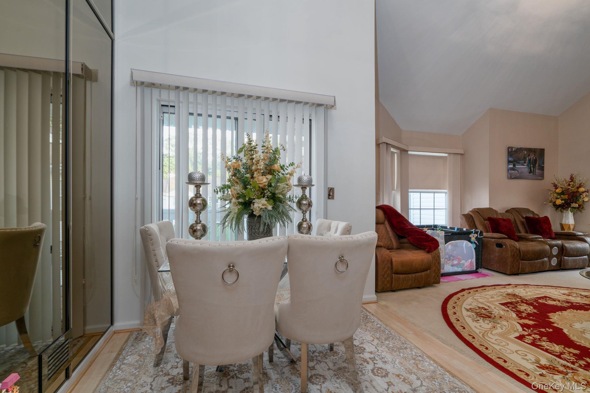 205 Ramapo Road, Unit H Garnerville, NY 10923 - Photo 9 of 31 a living room with furniture and a potted plant