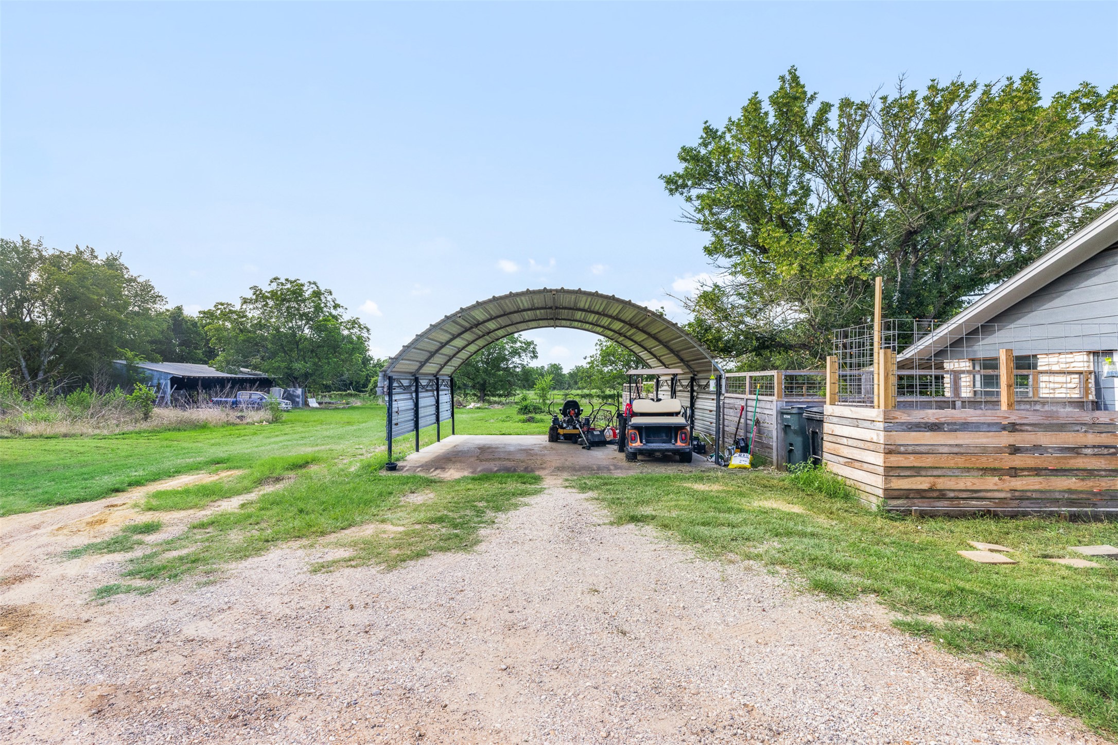 1015 FM 112 Road Lexington, TX 78947 - Photo 38 of 38 a view of a house with backyard and porch