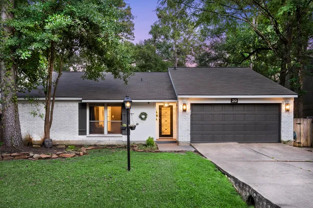 front view of house with a yard