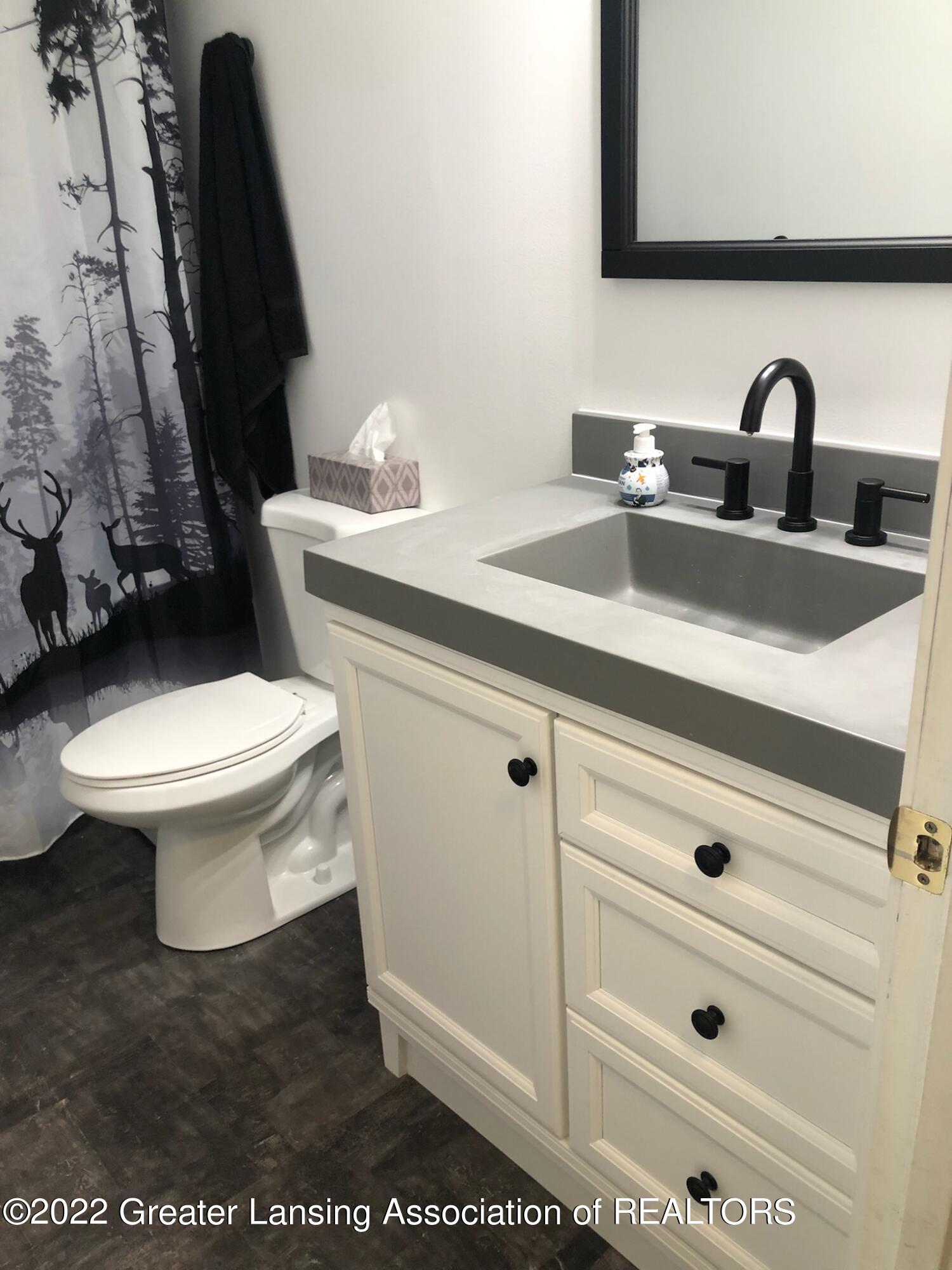 9690 Beardslee Road Perry, MI 48872 - Photo 12 of 31 Bathroom vanity