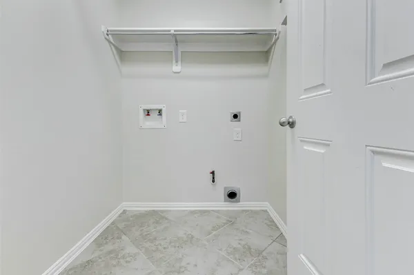 a bathroom with a bathtub and a window