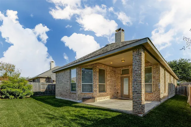a white toilet sitting next to a bath tub