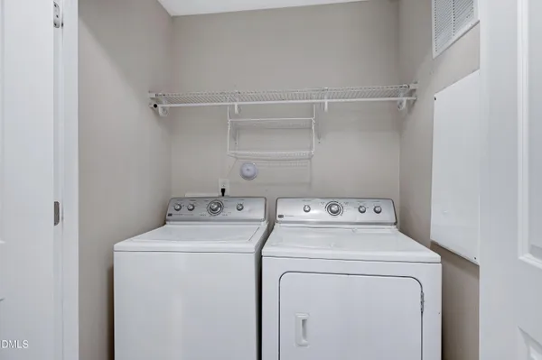 a picture of a bench in front of a building