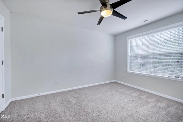 a picture of wall with a bathroom