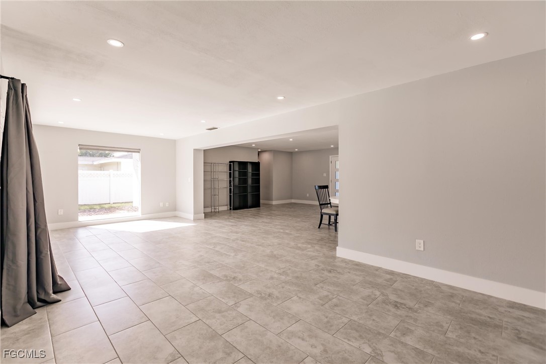 905 Dean Way Fort Myers, FL 33919 - Photo 19 of 43 a view of an empty room with a window