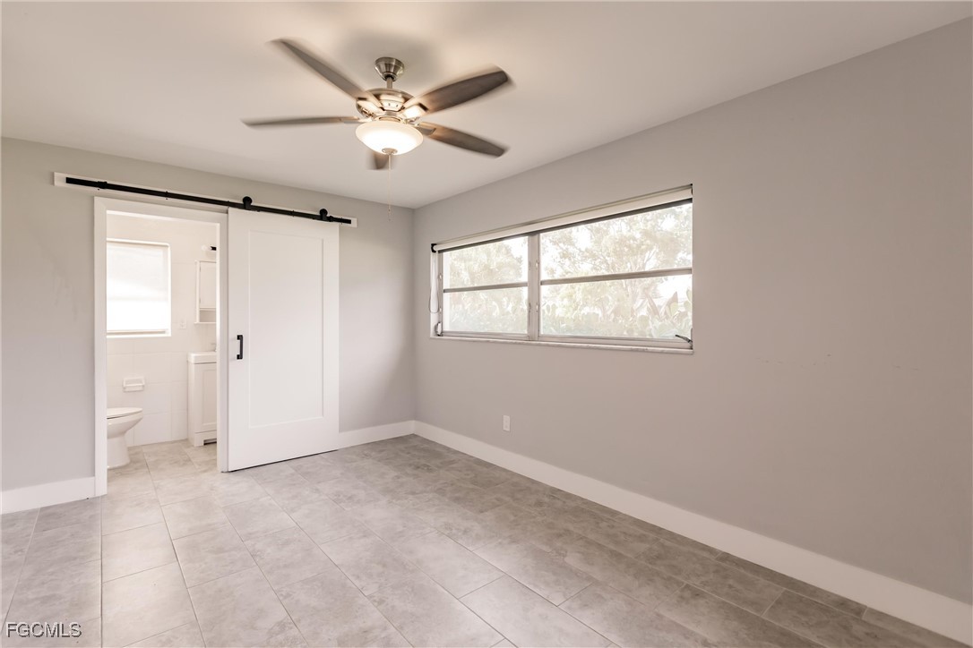 905 Dean Way Fort Myers, FL 33919 - Photo 27 of 43 a view of an empty room with a window