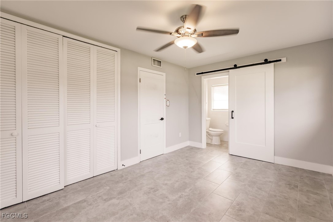 905 Dean Way Fort Myers, FL 33919 - Photo 28 of 43 a view of an empty room with a window