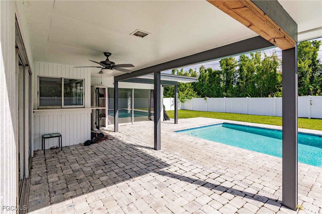 905 Dean Way Fort Myers, FL 33919 - Photo 35 of 43 a view of a swimming pool with a balcony