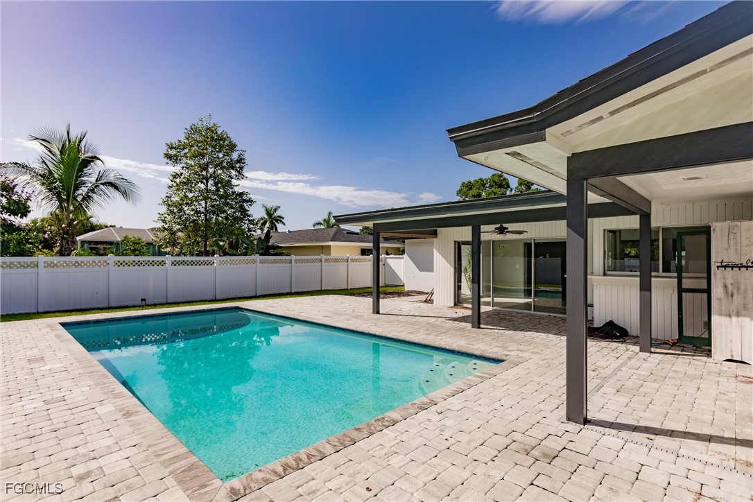 905 Dean Way Fort Myers, FL 33919 - Photo 38 of 43 a view of a backyard with swimming pool