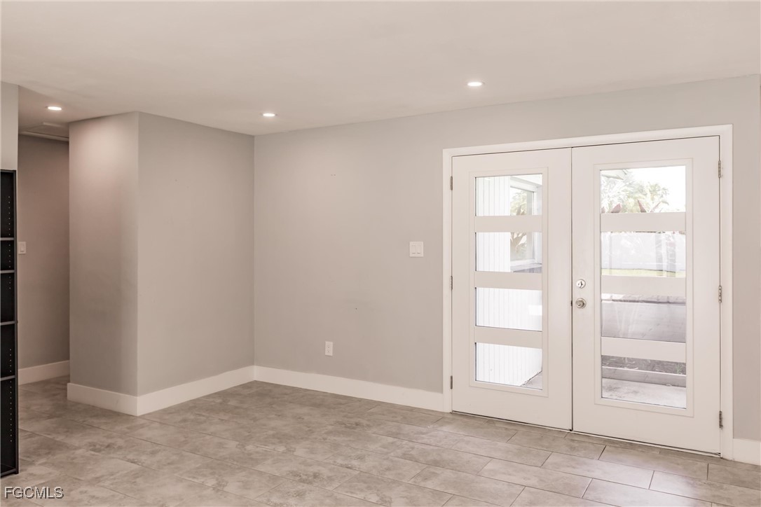 905 Dean Way Fort Myers, FL 33919 - Photo 7 of 43 an empty room with window